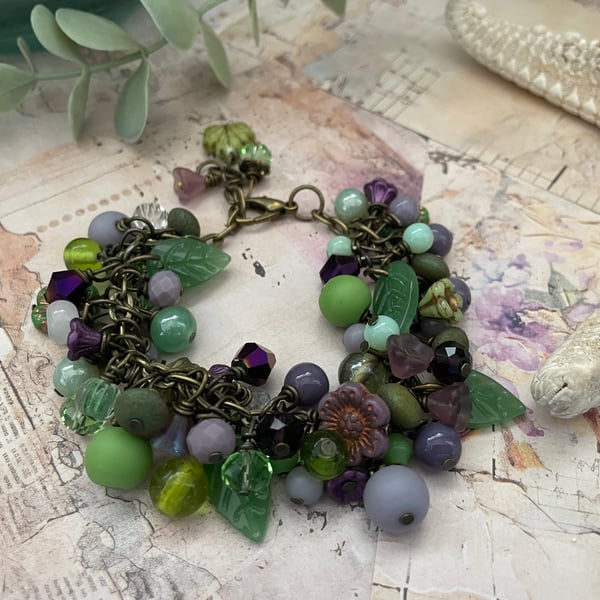 Beautiful glass beaded lilac and green charm bracelet 