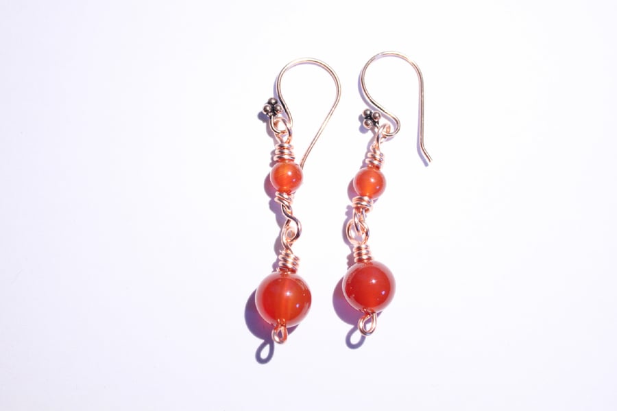Rich orange carnelian and copper dangle earrings