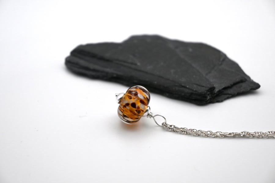 Leopard print lampwork glass pendant necklace