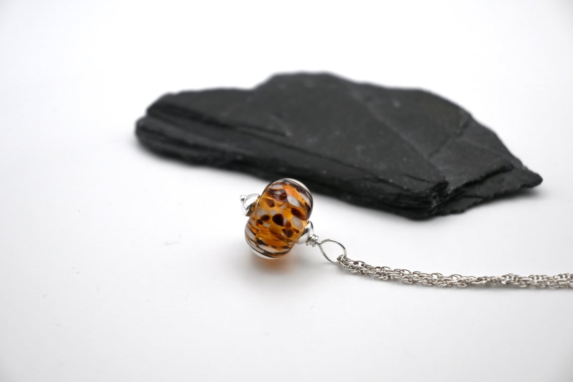 Leopard print lampwork glass pendant necklace