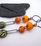 orange and green leaf ceramic earrings - Image 3