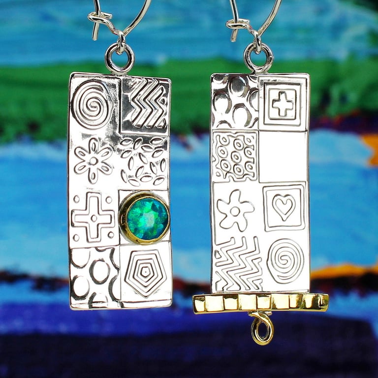 Asymmetrical handmade earrings, sterling silver with a blue Opal. Stone choice