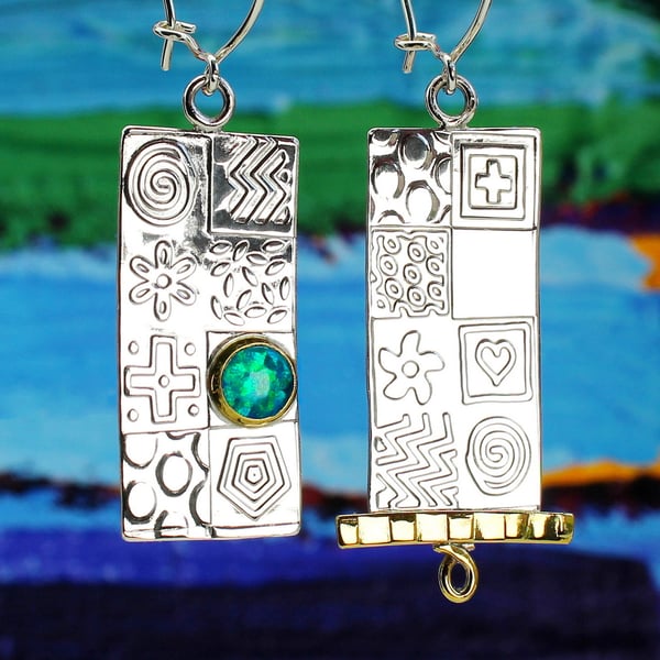 Asymmetrical handmade earrings, sterling silver with a blue Opal. Stone choice