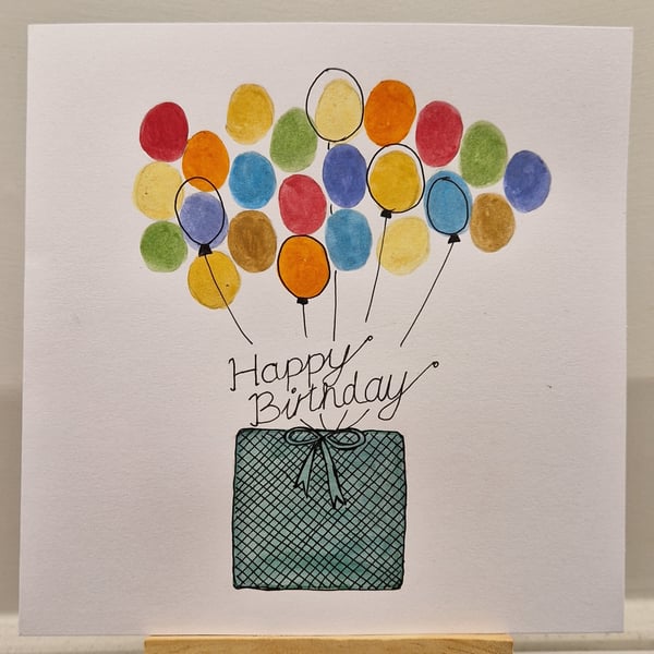 Colourful balloons & a green gift box Happy Birthday handmade watercolour card