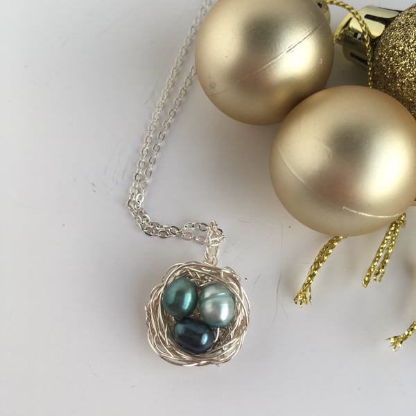 Blue pearl birds nest pendant - made in Scotland. 