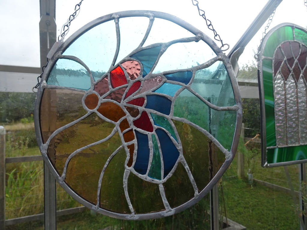Stained Glass Suncatcher. Circular Butterfly, Multi Coloured Glass. 