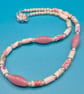 Flowery dusky pink paper beaded necklace with pearly beads