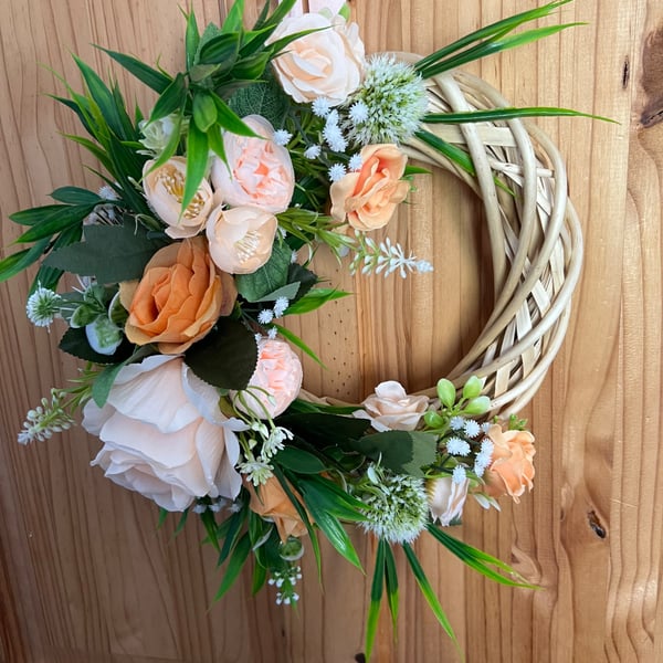 Peach and orange wicker door wreath