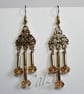 Amber Crystal Dangly Earrings - Image 1