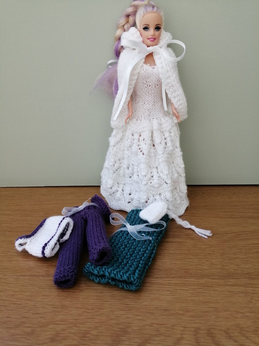 Set of hand knitted items for a teenage doll