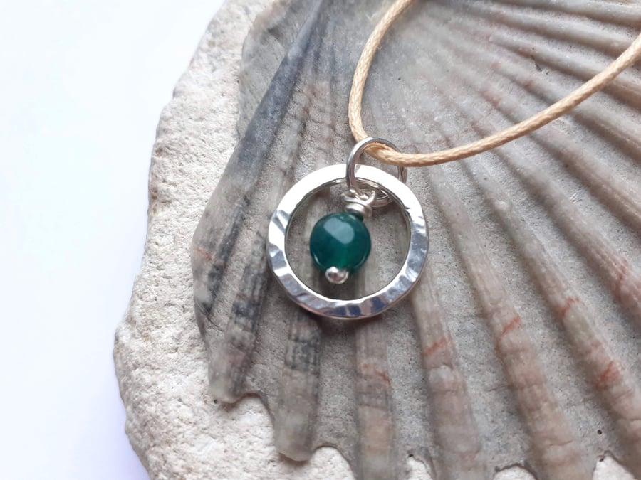 Emerald and sterling silver pendant, made with reconstituted emerald