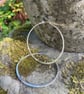 Large silver hammered hoop earrings