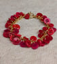 Red button bracelet with gold chain and toggle clasp  - Image 4