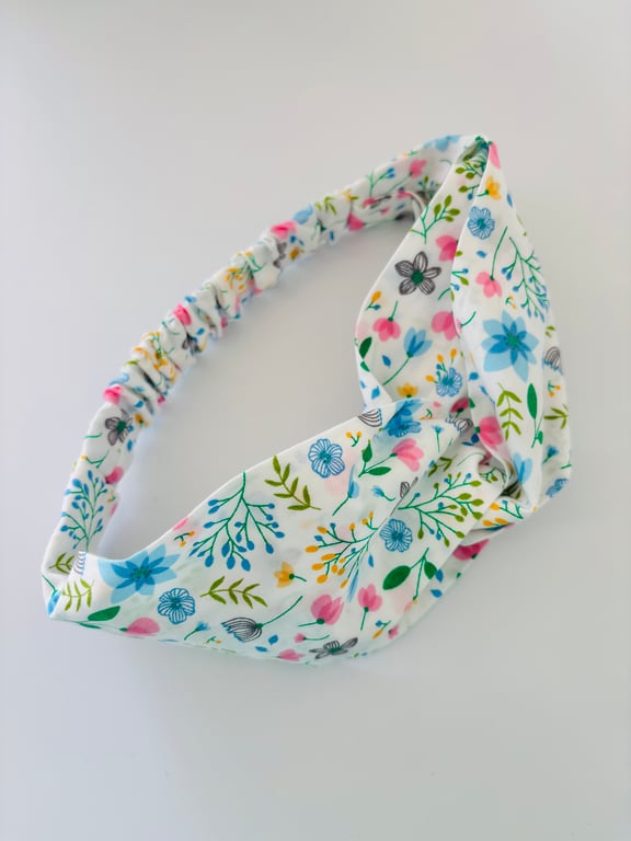 Cotton headband, twist knot style hairband in a white, pink & blue floral design