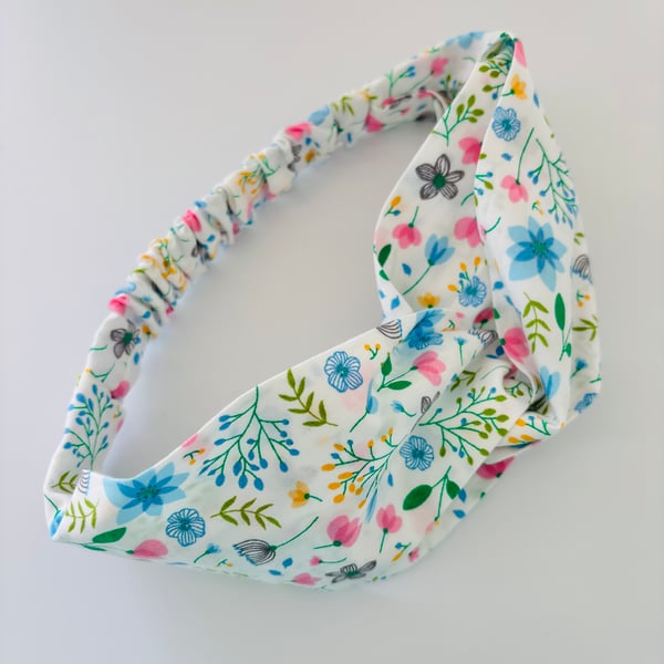 Cotton headband, twist knot style hairband in a white, pink & blue floral design