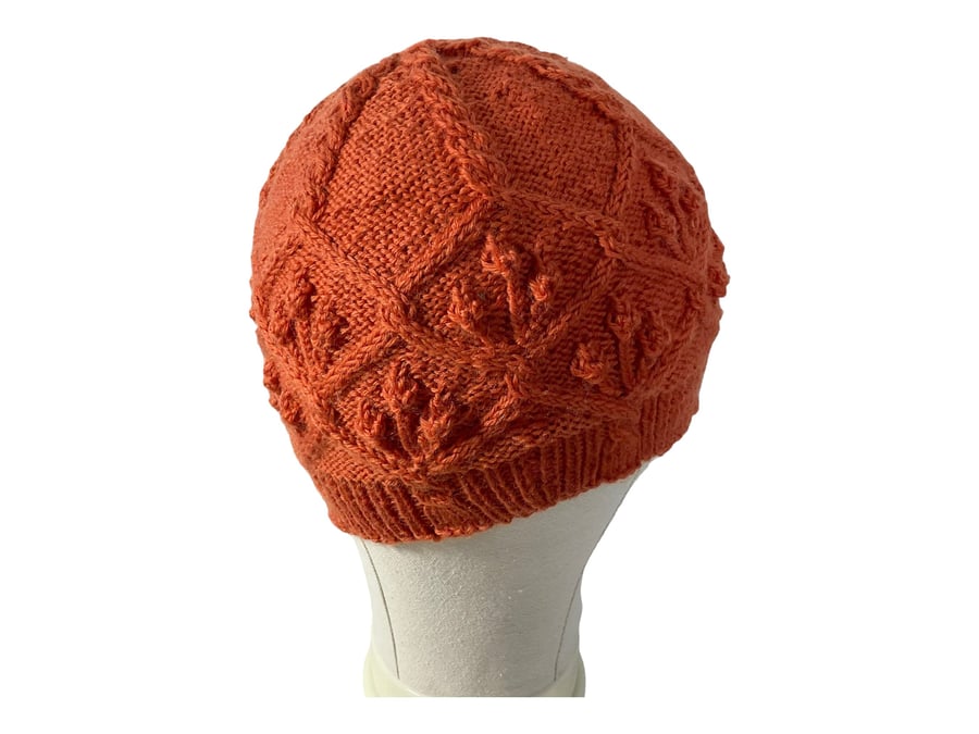 Hat with cables and bobbles in a burnt orange pure wool , fitted cabled beret, w