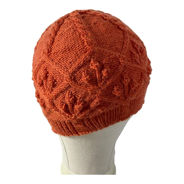 Hat with cables and bobbles in a burnt orange pure wool , fitted cabled beret, w