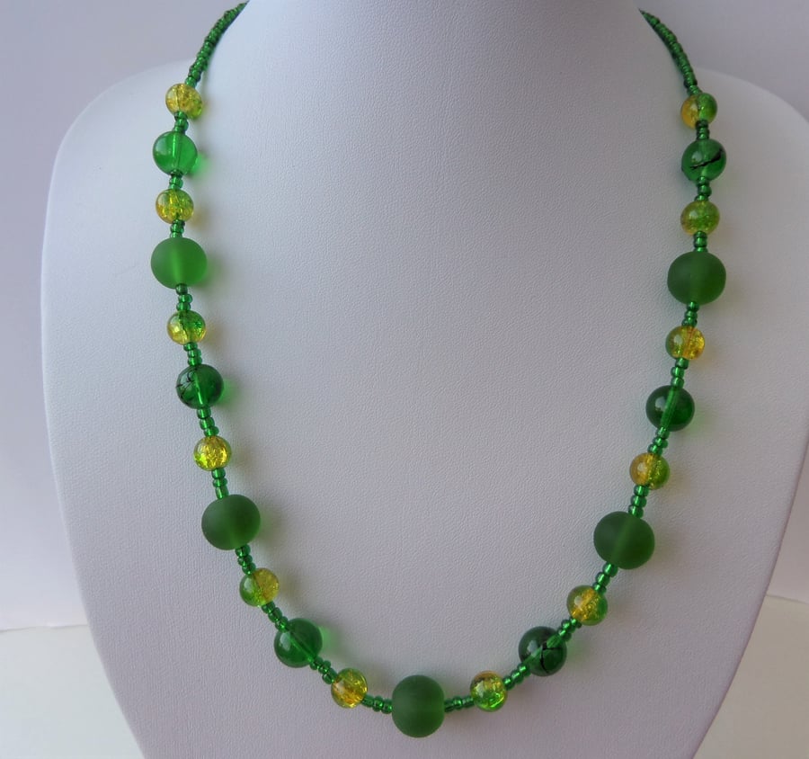 Mixed green bead necklace with a hint of yellow