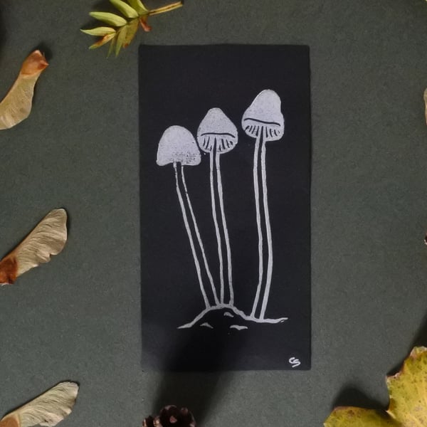 White Mushrooms – Small handmade lino print on black paper