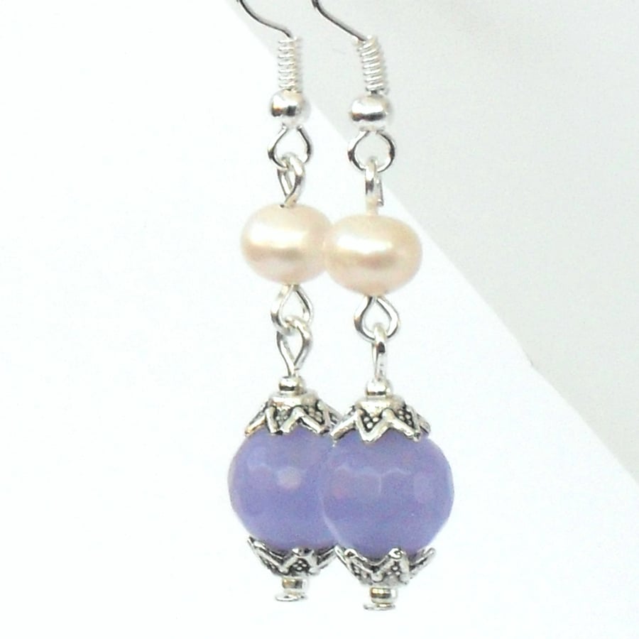 Cream pearl and purple alexandrite earrings