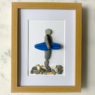 Cornwall Pebble and shell surfer art in unglazed wood frame 