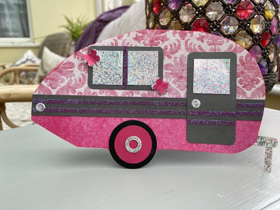 Pink and glittery caravan shaped card