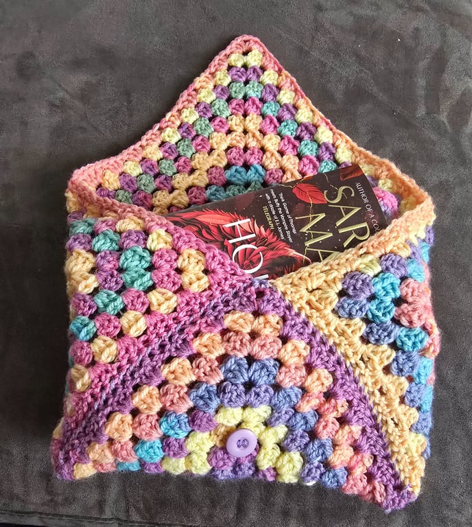 Granny square crocheted book cover or Kindle cover. 
