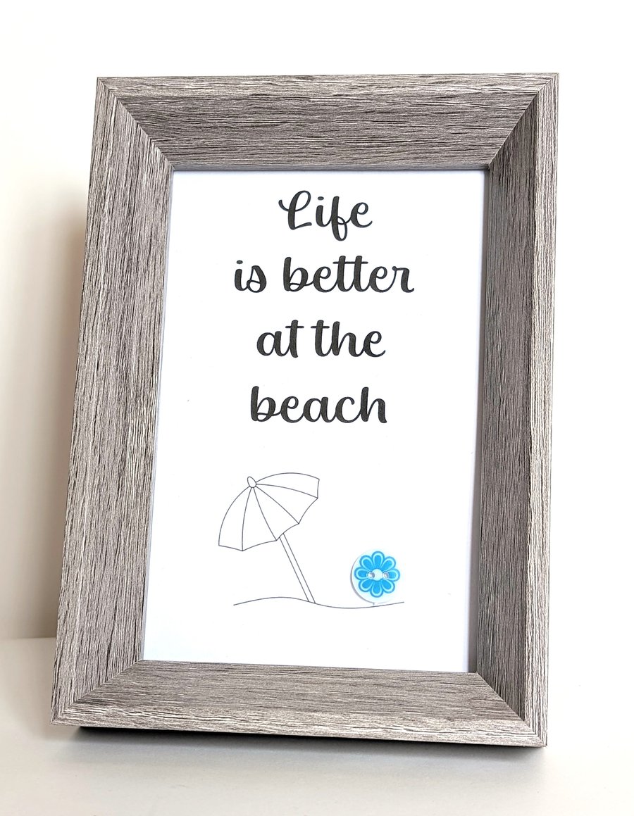 6 x 4 Framed button picture saying Life is better at the beach