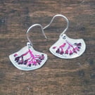 Silver earrings with red and pink detail