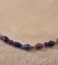Purple paper and glass beaded necklace