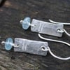 Notched silver and aquamarine earrings
