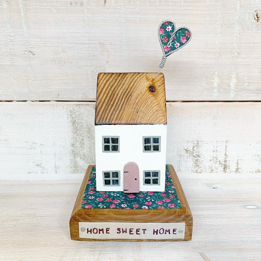 Wooden House with Heart and Home Sweet Home tag
