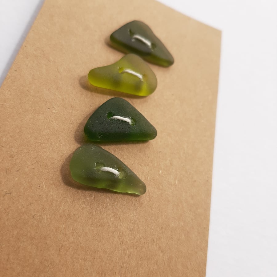 Set of four green sea glass buttons