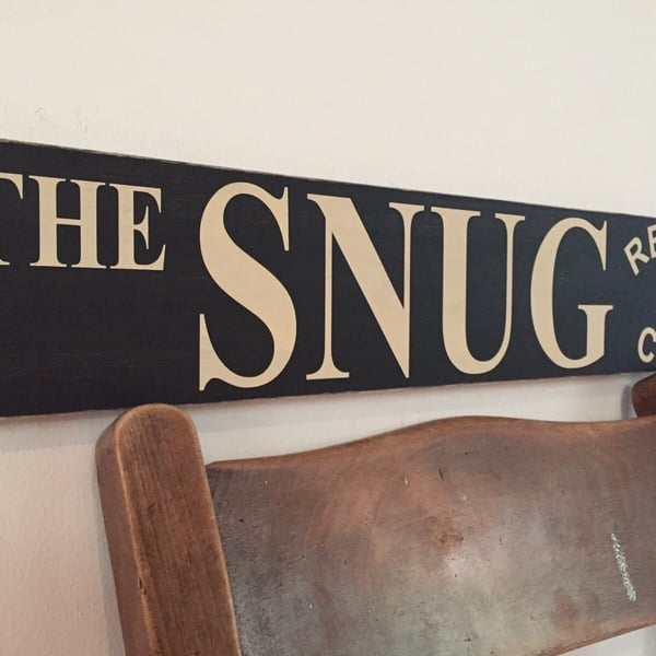 The Snug vintage style hand painted wooden sign.