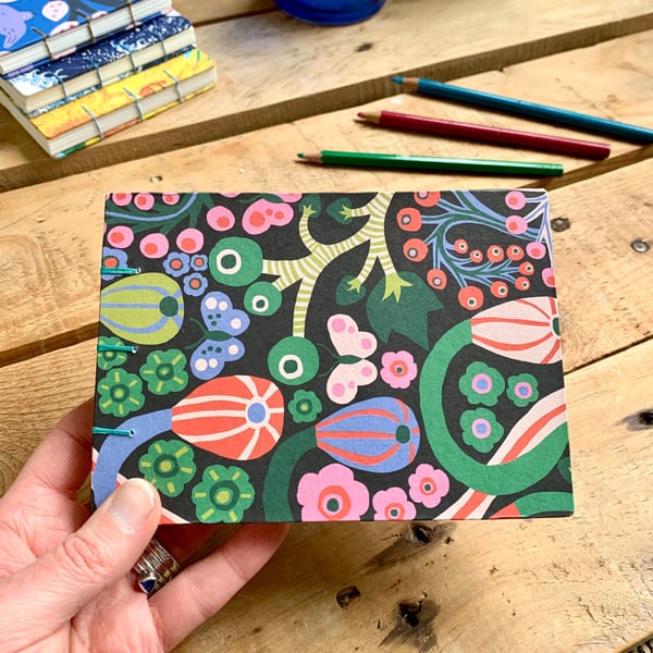 Hand Bound A6 Watercolour Sketchbook with Coptic Stitch Exposed Spine.
