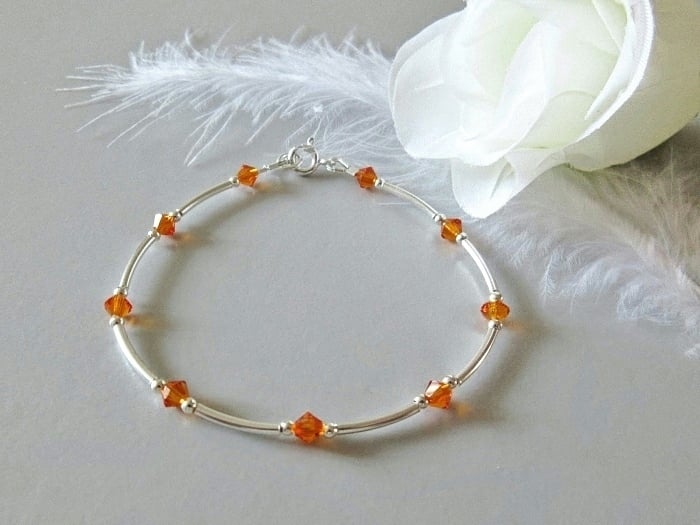Tangerine Orange Crystals Bracelet With Sterling Silver Curved Tubes