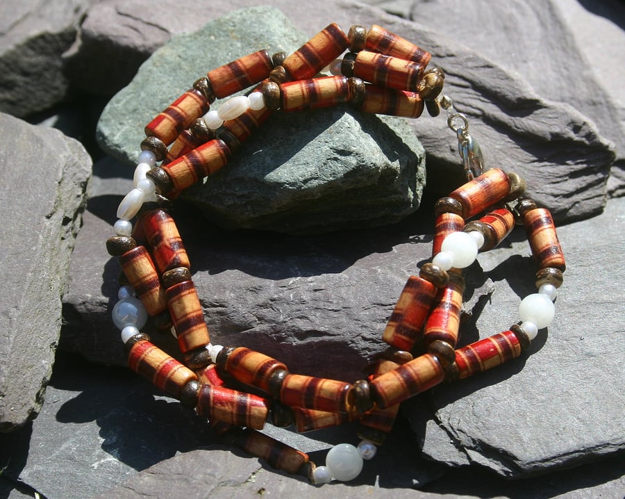 Sale item. 50% off wooden triple plaited strand bracelet