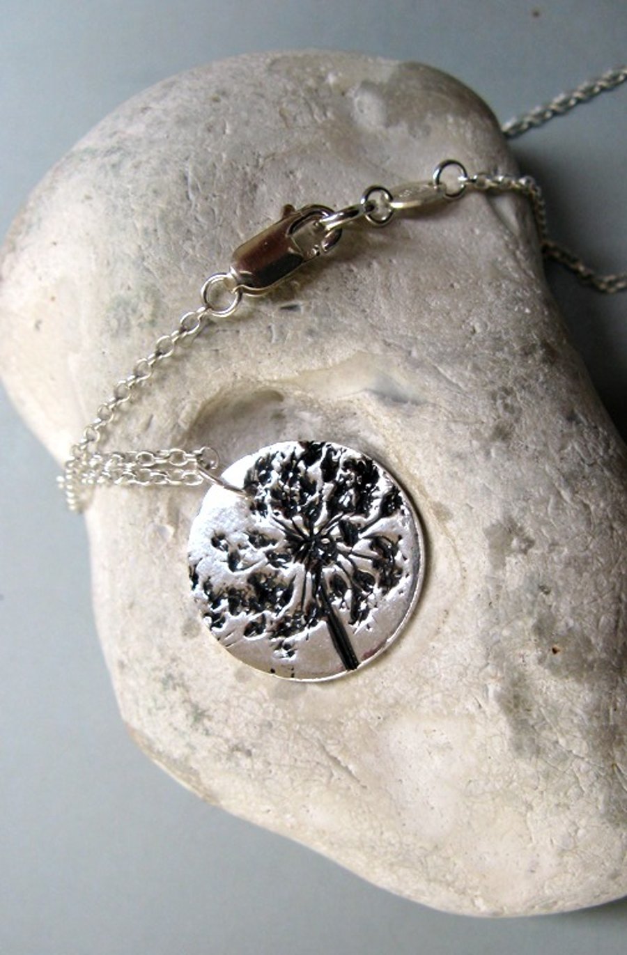 Fine silver necklace with clover flower imprint