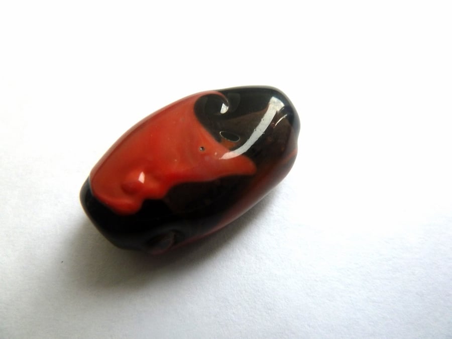 black with red shards, handmade lampwork glass bead