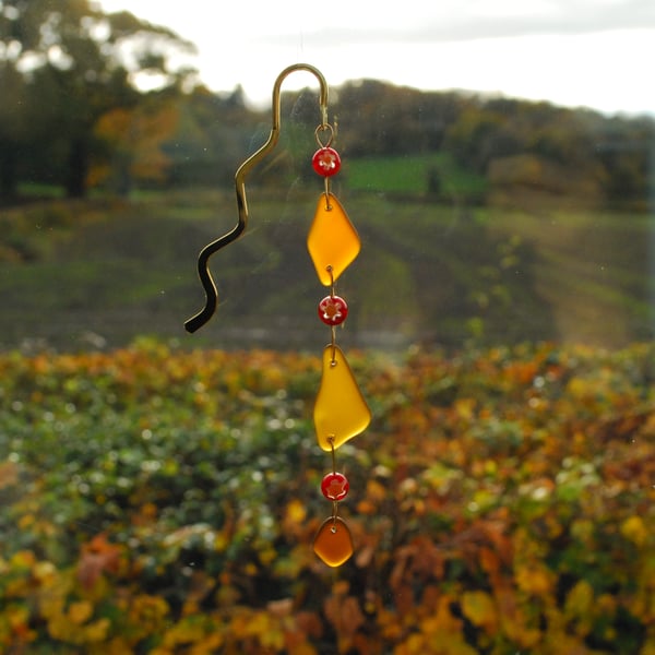 Brown beach glass bookmark with millefiori beads