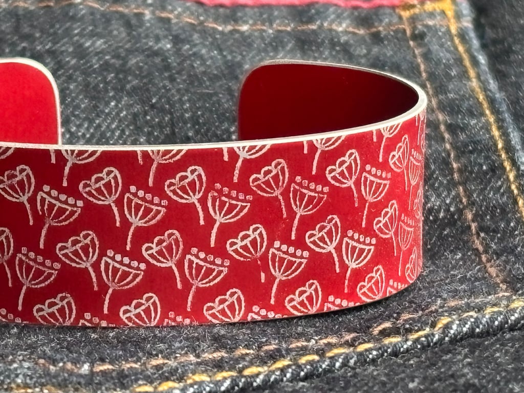 Geometric seed head print cuff bracelet red