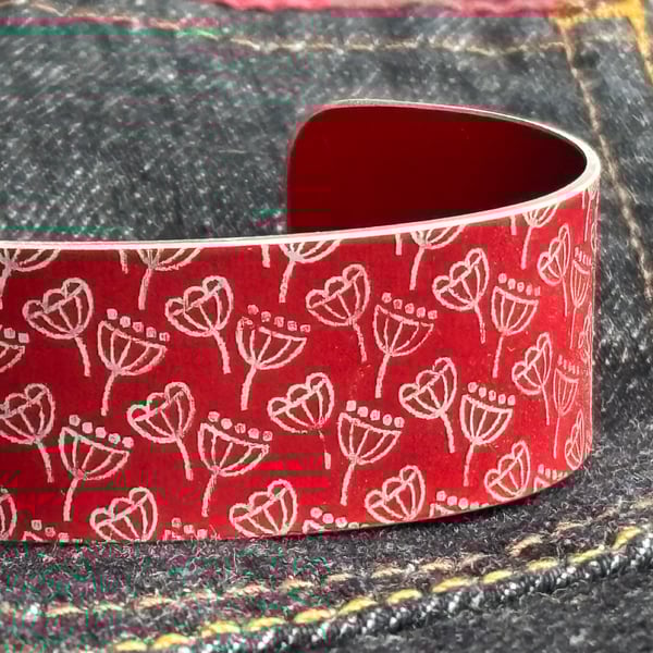 Geometric seed head print cuff bracelet red