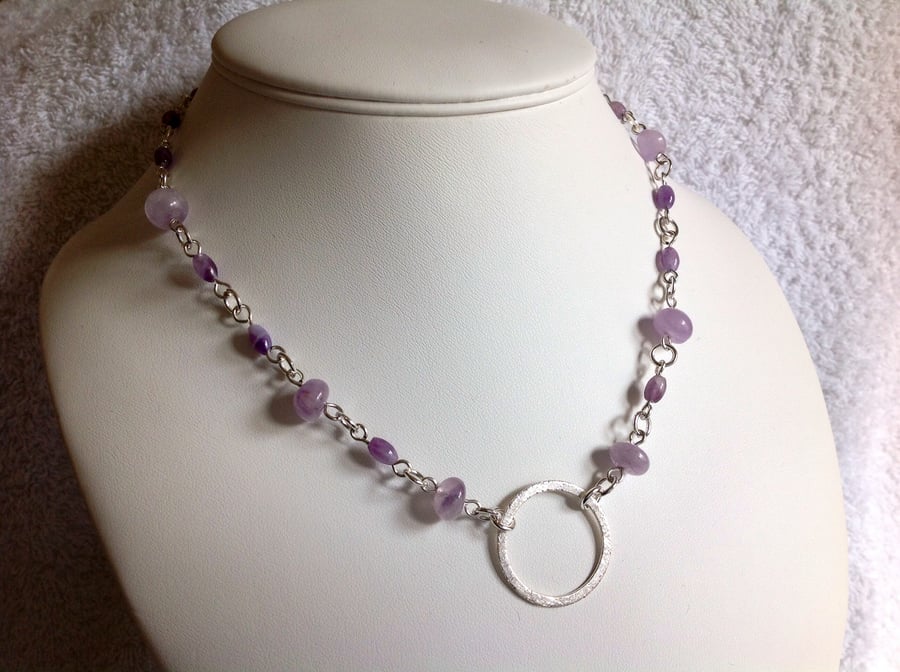 Light purple amethyst and silver circle necklace.