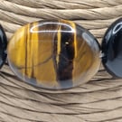 Cassini. Tiger Eye and Black Agate Stone Bracelet by B.D.S.