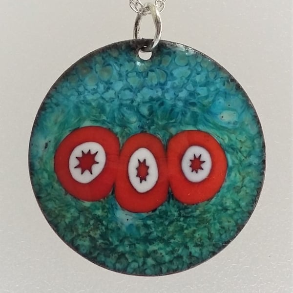 'Opposites attract’ millefiori pendant in enamelled copper 123