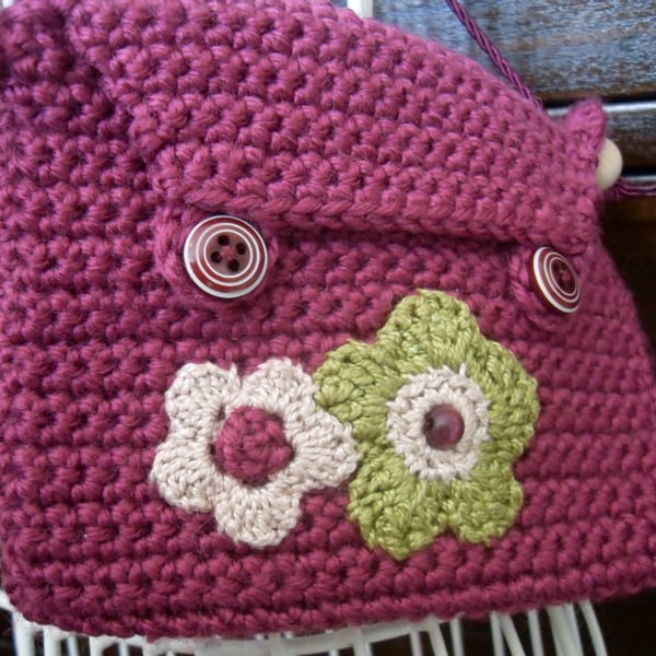 Small Satchel Bag, in plum pink with applique crochet flowers and button detail.