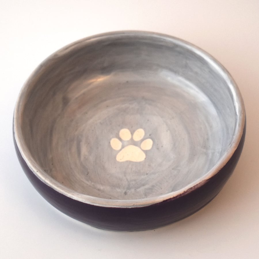 19-260 Hand thrown pawprint bowl in purple (Free UK postage)