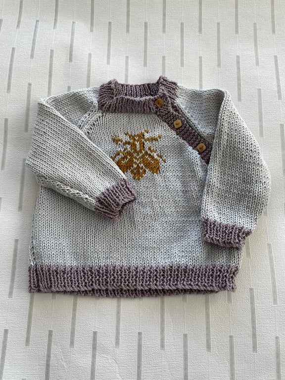 Hand knitted jumper with bee motif