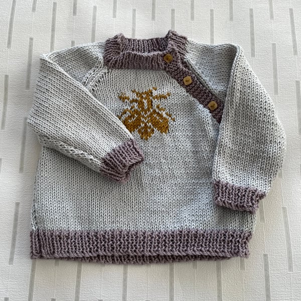 Hand knitted jumper with bee motif