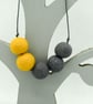 Felted bead necklace in grey and yellow wool - Image 4